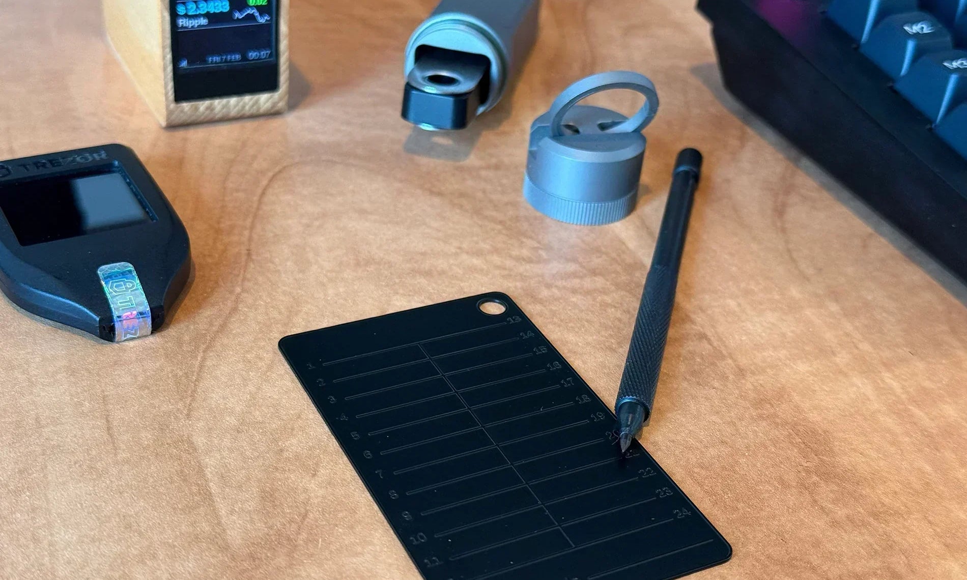 Trezor wallet, ledger nano wallet, Black Seed Ink seed phrase wallet and scribing tool