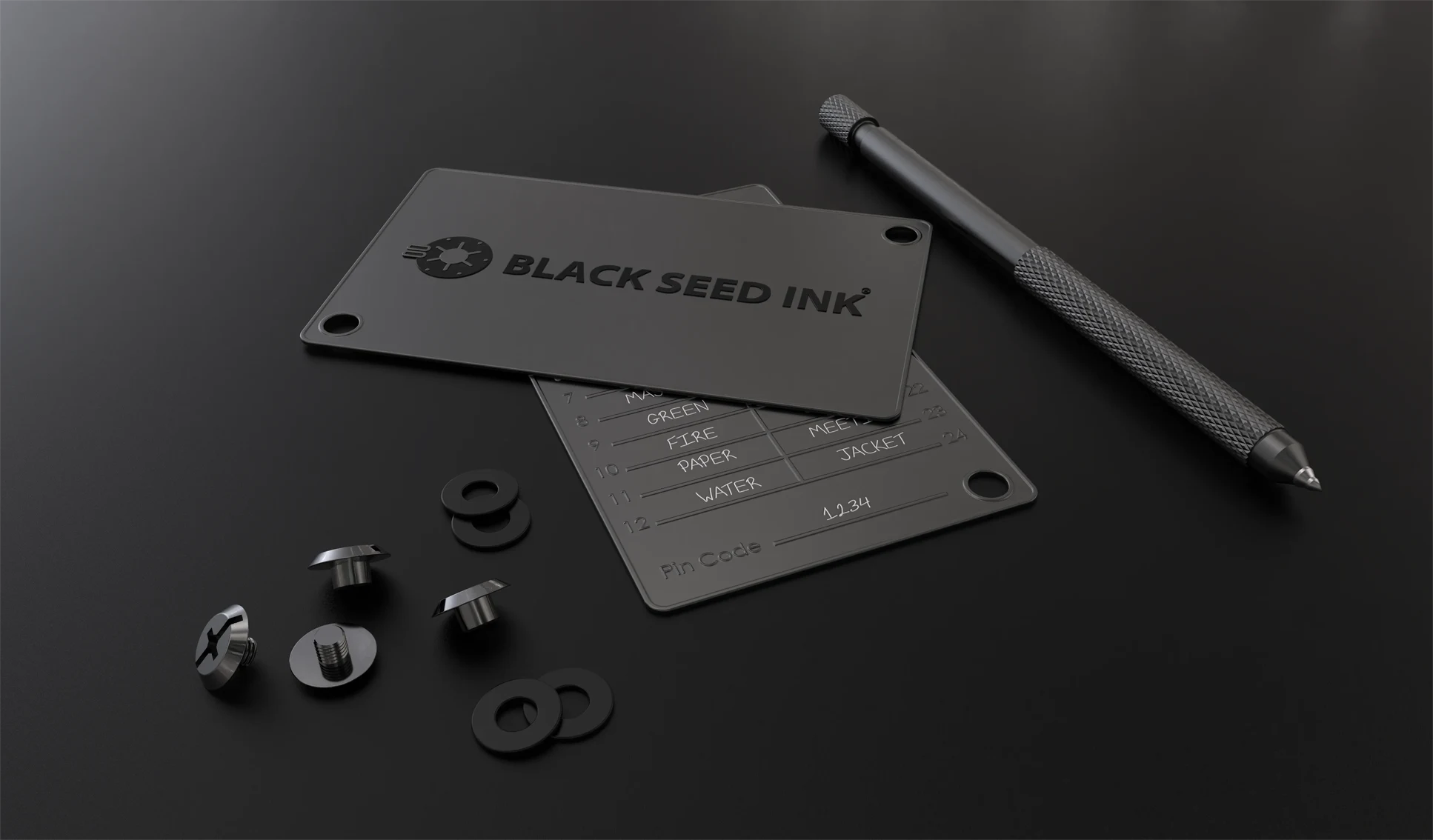 Two Seed Phrase wallets with etching, and displayed with the Black Seed Ink custom designed scribe and Canadian screws and washers.